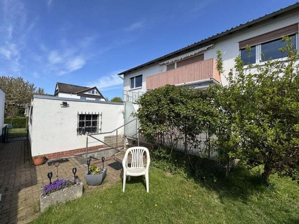 Immobilie in Barsinghausen - Zweifamilien - Doppelhaushälfte mit Terrasse, Balkon und zwei Garagen - Bild 4