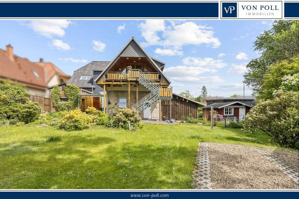 Immobilie in Soltau - Einfamilienhaus mit Einliegerwohnung und traumhaftem Garten - Bild 0