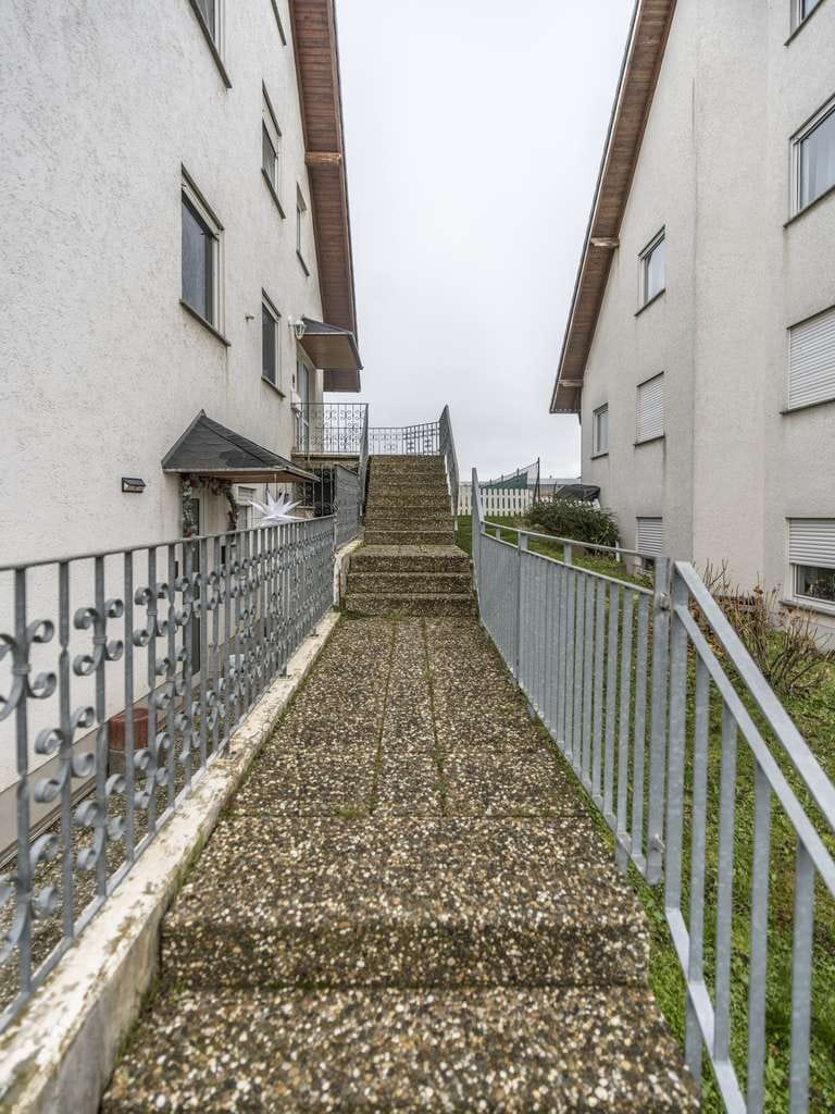 Immobilie in Hünfelden - WOW *Paul & Partner* INVESTMENTCHANCE: MEHRFAMILIENHAUS IN BELIEBTER UND RUHIGER WOHNLAGE! FAKTOR 18 - Bild 4