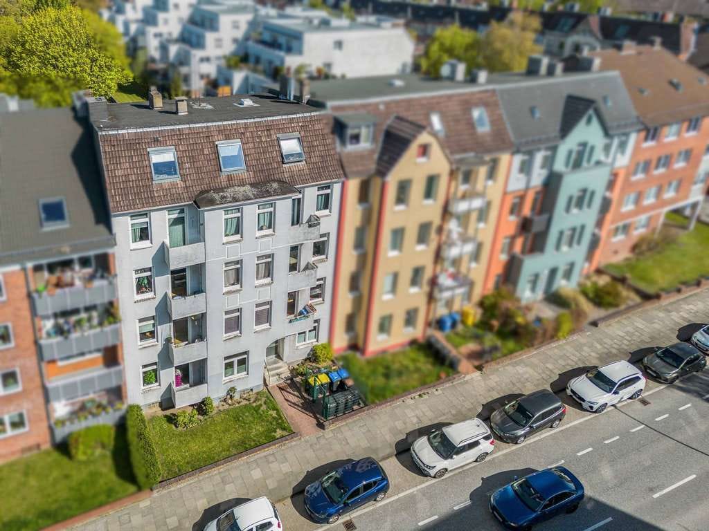 Immobilie in Molfsee - Solides Mehrfamilienhaus mit 9 Wohneinheiten in Kiel-Hassee! - Bild 2