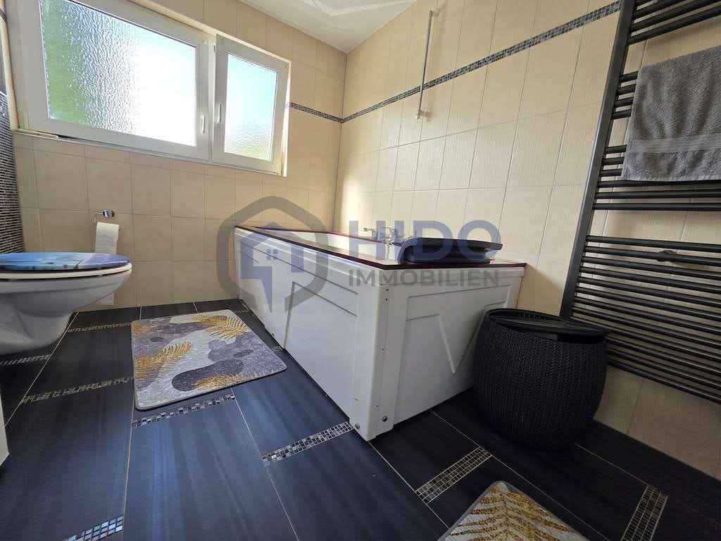 Immobilie in Wirges - Einfamilienhaus in Reihenendlage mit Garten & Garage – modernisiert & mit Gestaltungspotenzial - Bild 4