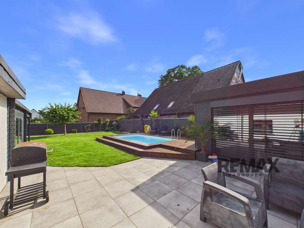 Immobilie in Didderse - Exklusives Doppelanwesen mit Pool - zwei hochwertig sanierte Einfamilienhäuser in ruhiger Lage - Bild 1