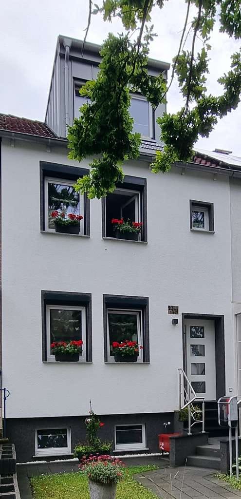 Immobilie in Waltrop - Wohnen am Waldrand**Charmantes Reihenmittelhaus - **Top renoviert und naturnah gelegen** - Bild 1