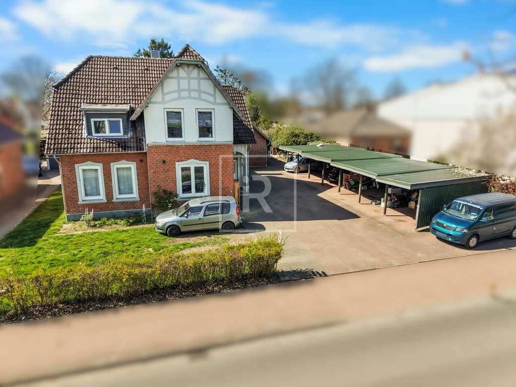 Immobilie in Hanerau-Hademarschen - Entwicklungspotenzial! Gepflegtes Mehrfamilienhaus mit 7 Wohneinheiten in Hanerau-Hademarschen! - Bild 2