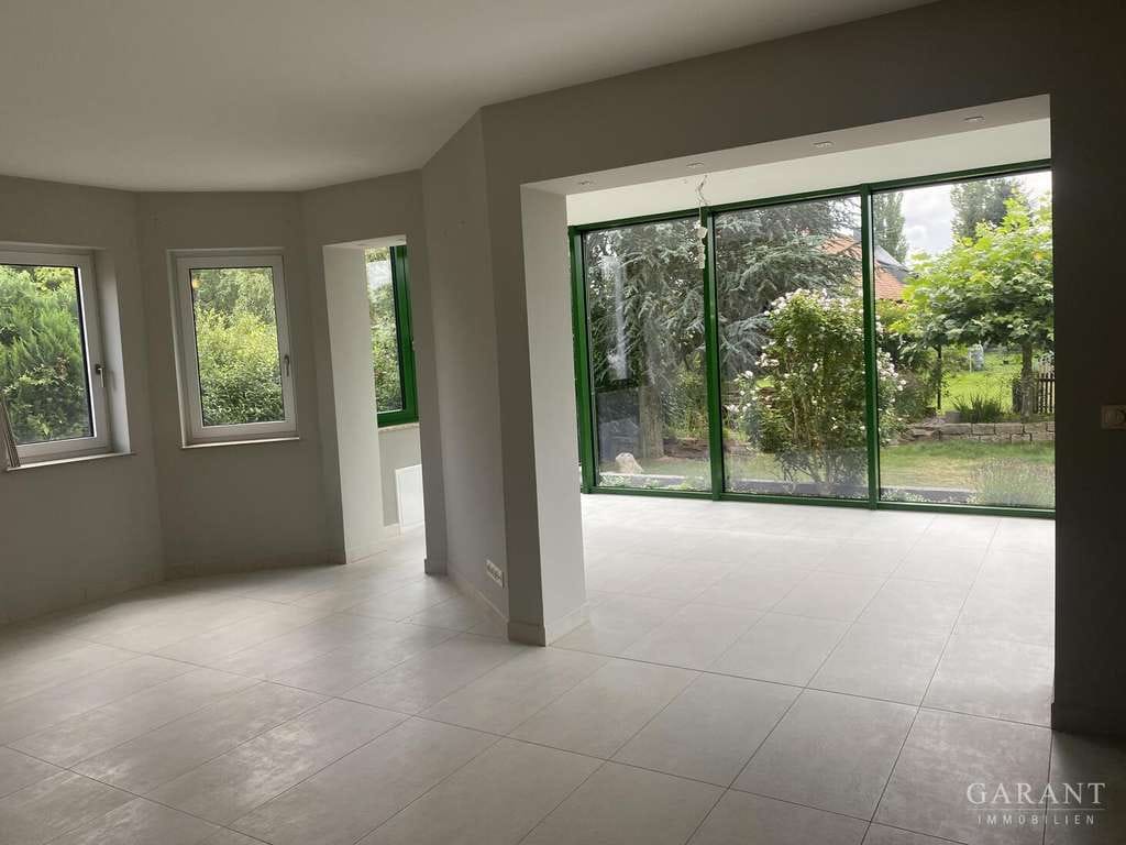Immobilie in Naunhof - Großzügiges Zweifamilienhaus mit Wintergarten, Sauna, zwei Kaminen, Garage und schönem Grundstück - Bild 2