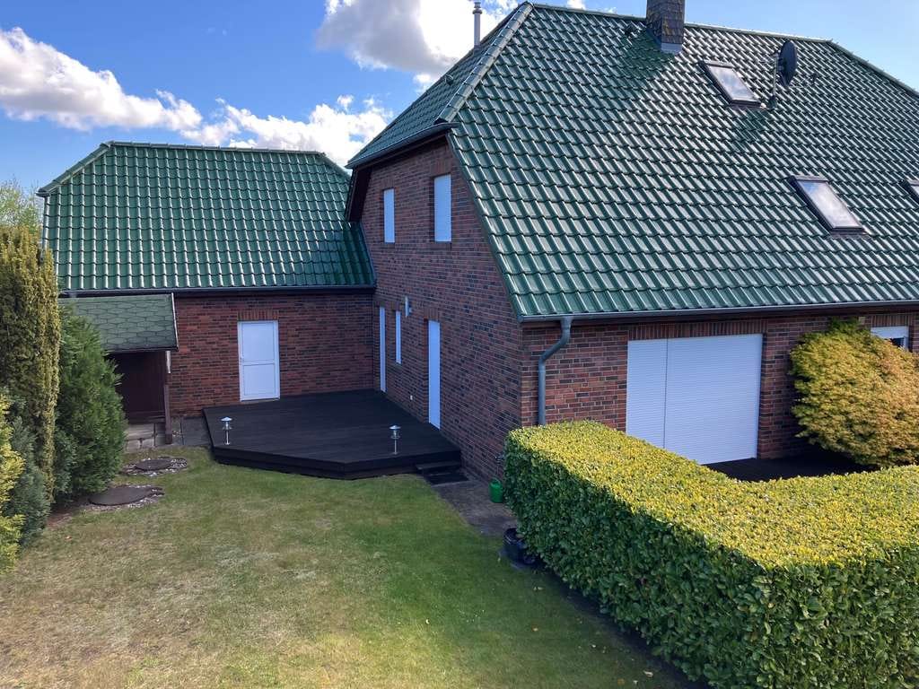 Immobilie in Dranske - Einfamilienhaus mit Einliegerwohnung + Garage - Bild 1