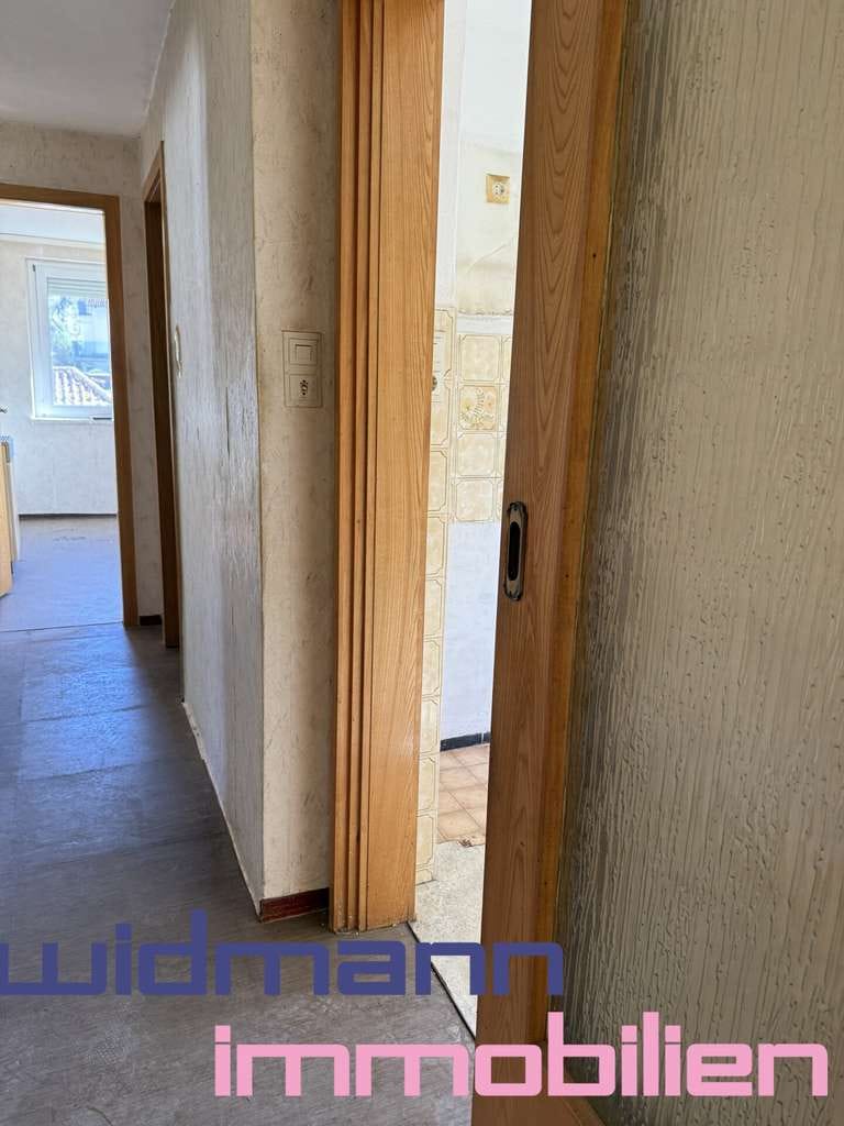 Immobilie in Korntal-Münchingen - Charmantes 50er-Jahre-Juwel mit Balkon und viel Gestaltungspotenzial - Bild 4