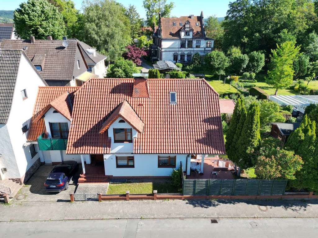 Immobilie in Lauenförde - Großzügiges Architektenhaus mit Schwimmbad & Sauna als Familiendomizil im idyllischen Weserbergland - Bild 0