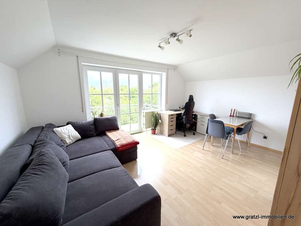 Immobilie in Neufahrn bei Freising - Charmante 2-Zimmer-Wohnung mit Südbalkon und freiem Blick im Zentrum von Neufahrn, TG & Keller inkl. - Bild 1