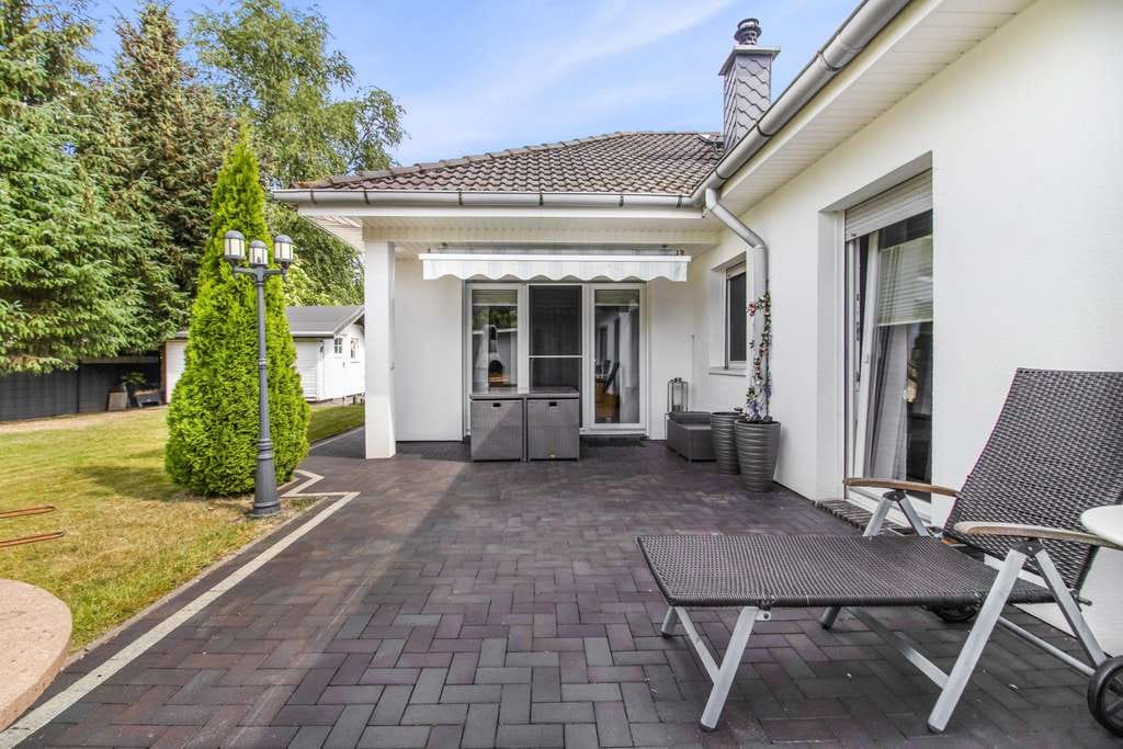 Immobilie in Oyten - Exklusiver Bungalow mit Einliegerwohnung, Doppelgarage und großem Grundstück in Oyten - Bild 4