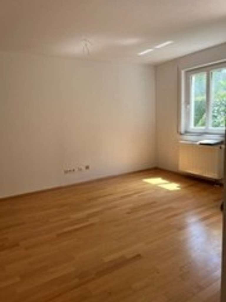 Immobilie in Unterföhring - 2-ZimmerEG mit Terrasse u. kleinen Garten - Bild 2