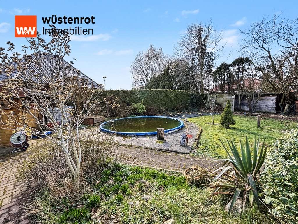 Immobilie in Neubörger - Ausgebauter Bungalow mit Wintergarten, Teich und Pool - Bild 3