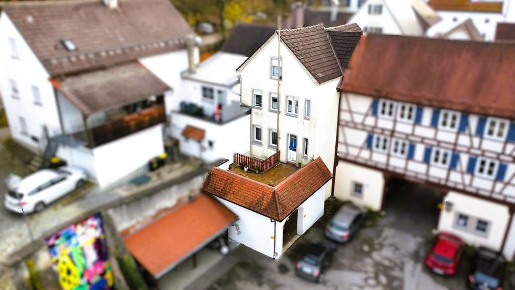 Immobilie in Leutkirch im Allgäu - Mehrfamilienhaus mit 7,7% Rendite im Herzen von Leutkirch! - Bild 1