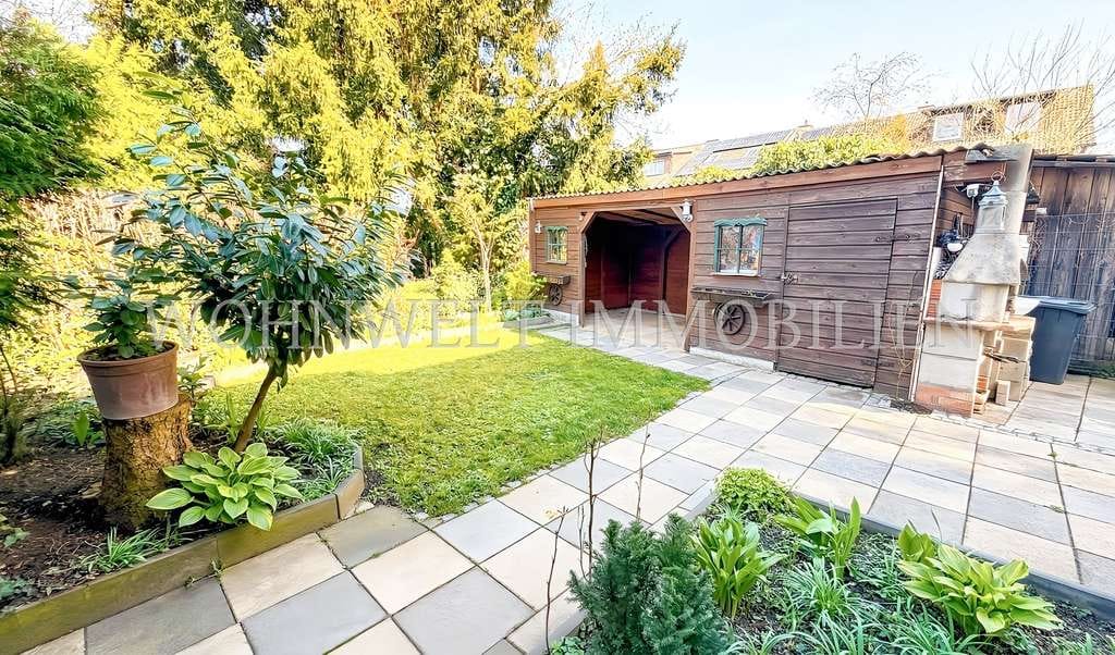 Immobilie in Eching - Charmantes Reihenendhaus mit großzügigem Garten - Bild 1