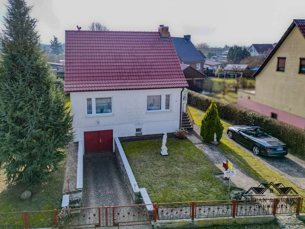 Immobilie in Barth - Wohnen in beliebter Lage - Ihr gepflegtes Einfamilienhaus mit großem Garten und Garage - Bild 4