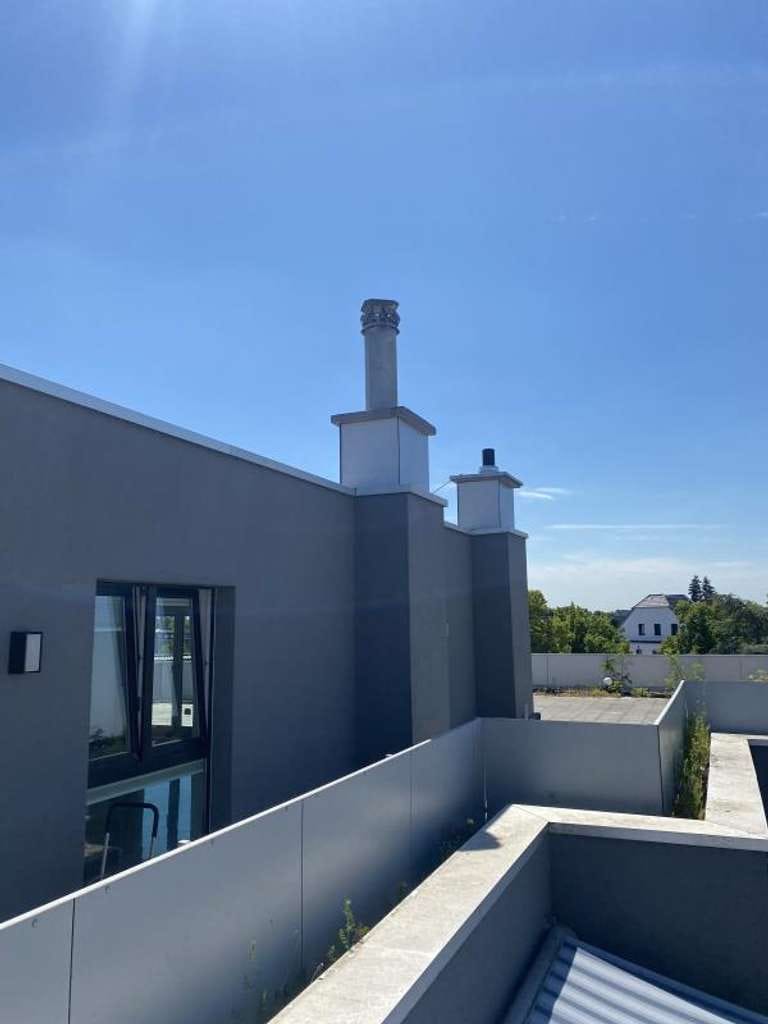 Immobilie in Meerbusch - Exklusive Penthouse-Wohnung mit Dachterrasse und traumhaftem Blick über Büderich  - Bild 4