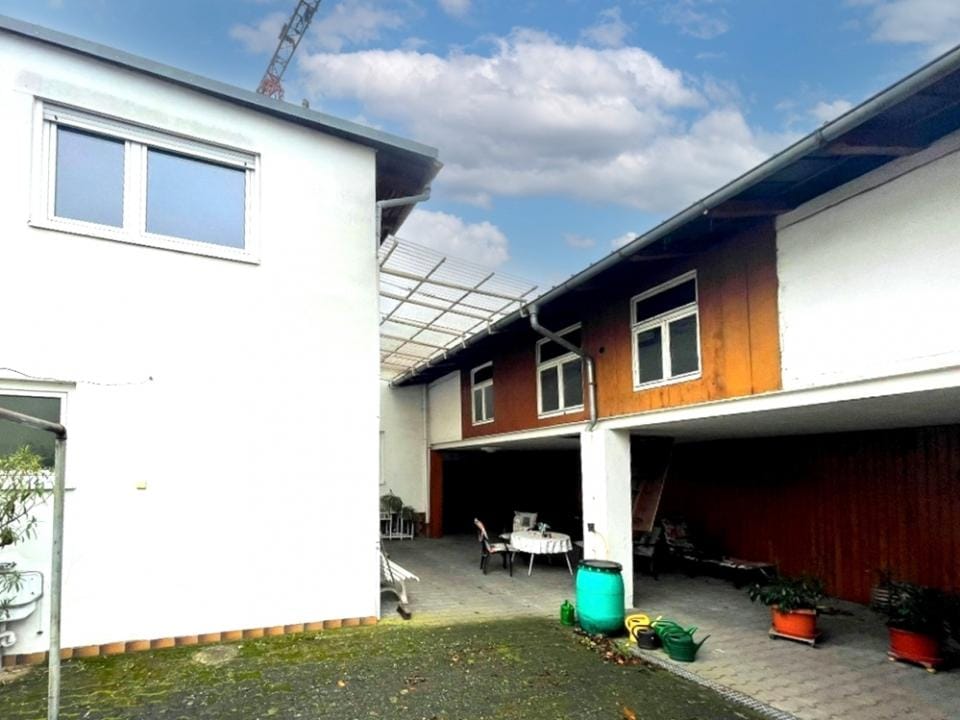 Immobilie in Oberhausen-Rheinhausen - GLOBAL INVEST SINSHEIM | Tolles Einfamilienhaus mit Nebengebäude in Oberhausen - Bild 4
