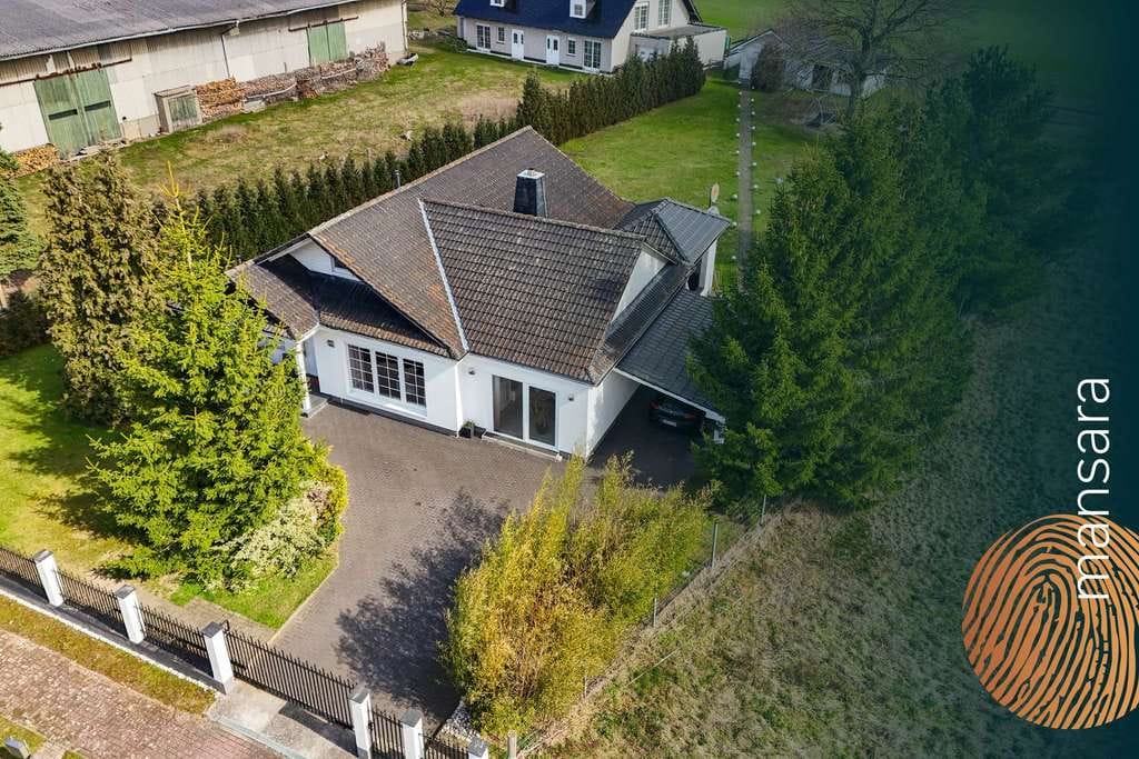 Immobilie in Oebisfelde-Weferlingen - Exklusives Wohnen auf 2.140 m² – stilvolles Familienhaus mit Studio, Kamin und Outdoor-Küche! - Bild 0