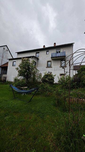 Immobilie in Eßweiler - Großes Einfamilienhaus mit Garten und Garage - Bild 2