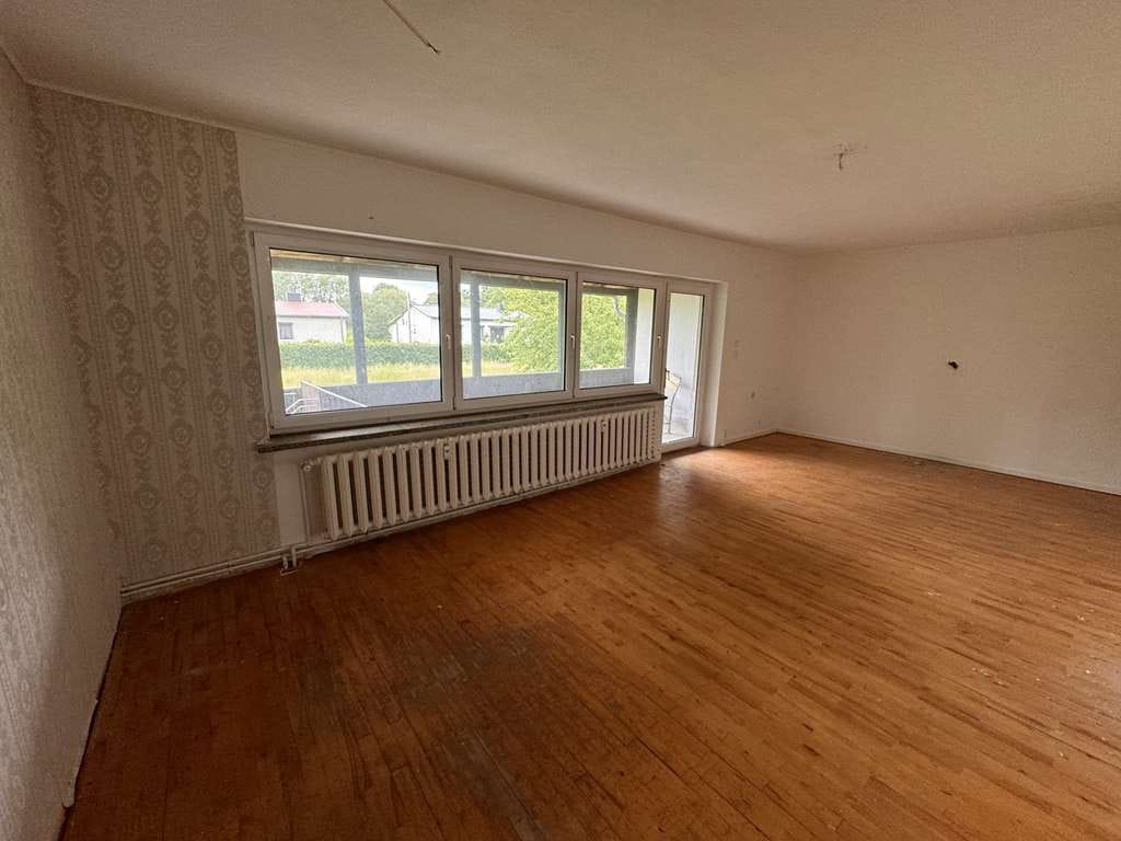 Immobilie in Dummerstorf - Sanierungsbedürftiges Einfamilienhaus mit Einliegerwohnung, großem Grundstück, Werkstatt und Garage - Bild 3