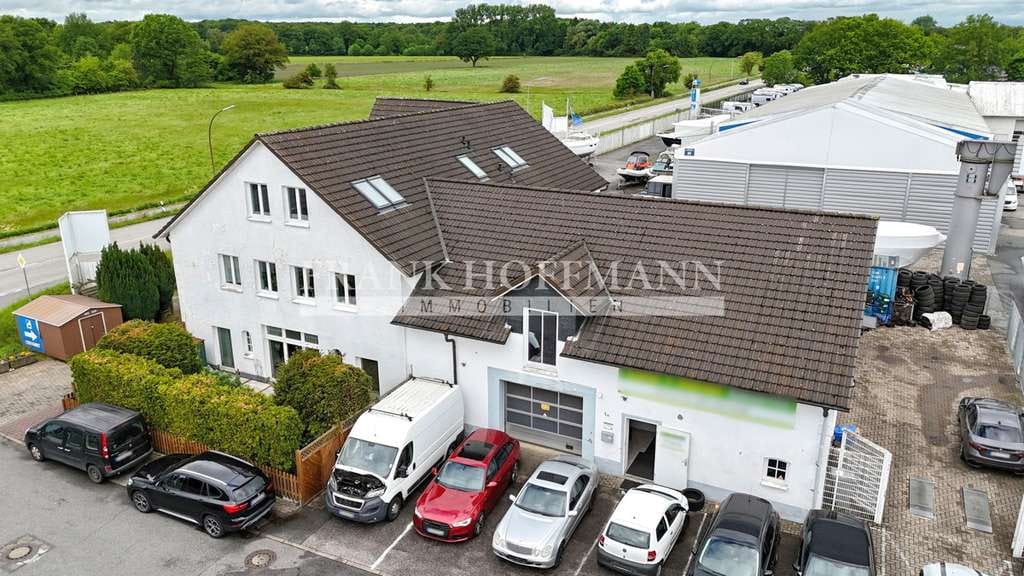 Immobilie in Bönningstedt - Mehrfamilienhaus mit 4 Wohneinheiten in Bönningstedt - Bild 1