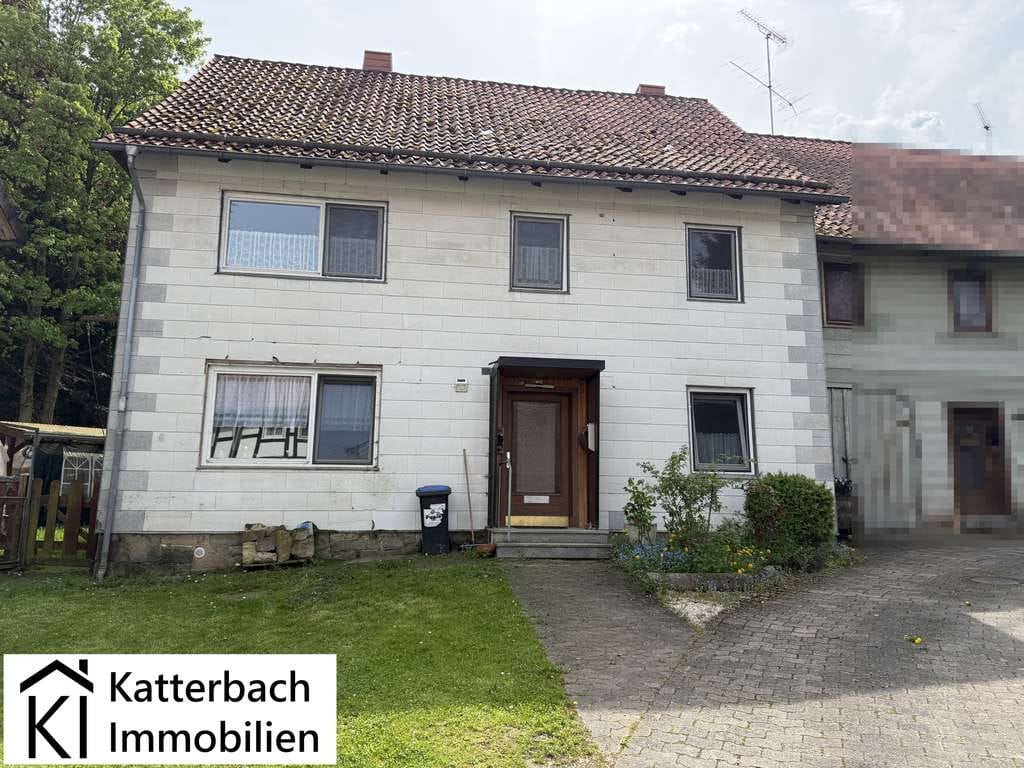 Immobilie in Kalefeld - Charmante Doppelhaushälfte mit separatem Gartenland im idyllischen Oldershausen - Bild 0