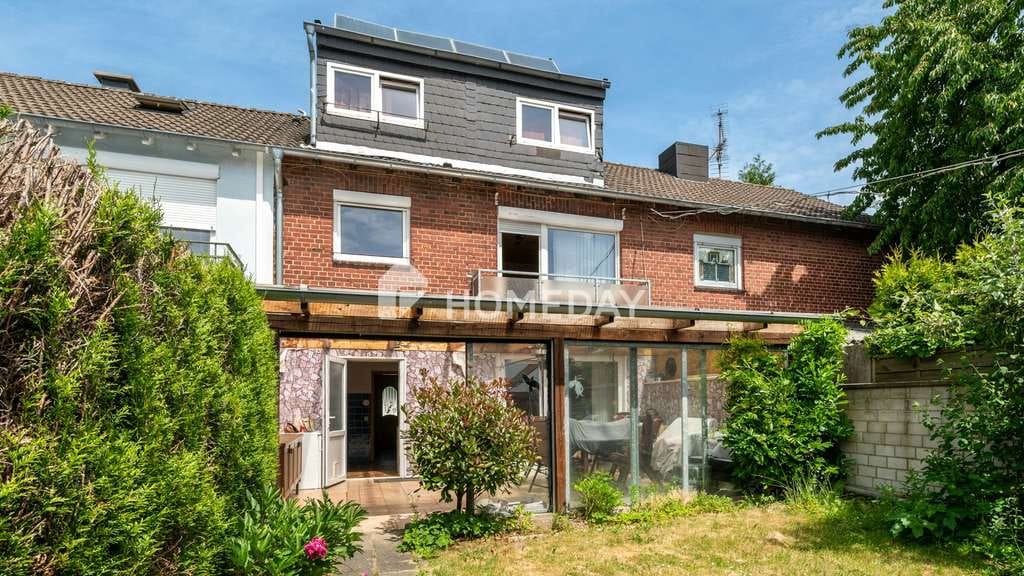 Immobilie in Erkelenz - Beständigkeit und Zukunft: Reihenhaus mit Garage, Partykeller, PV-Anlage und Solarthermie - Bild 1