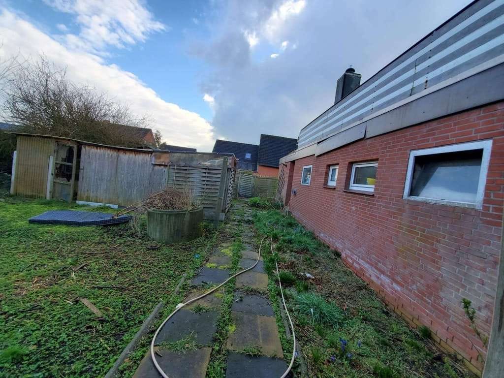 Immobilie in Wiesmoor - Freistehendes Einfamilienhaus mit großem Grundstück in ruhiger Wohnlage von Wiesmoor - Bild 3