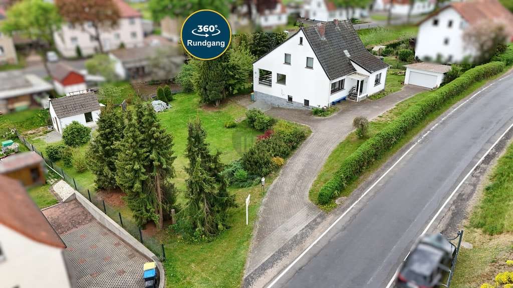 Immobilie in Dermbach - CHARMANTES EIGENHEIM MIT TRAUMBLICK UND GROSSZÜGIGEM GARTEN!! - Bild 0