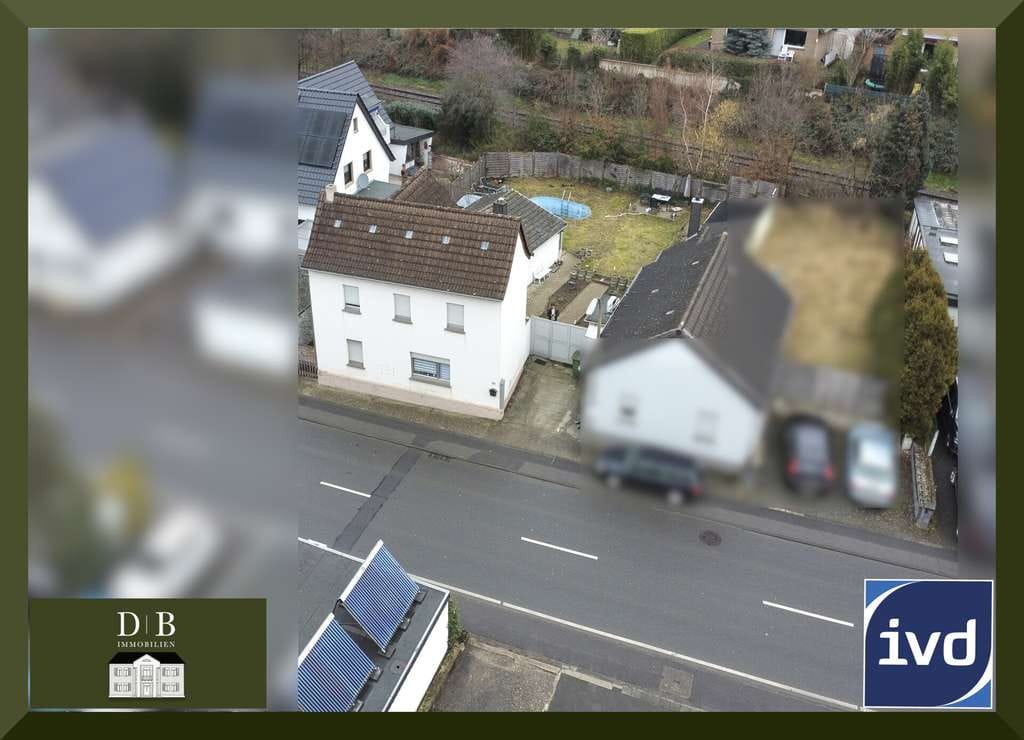 Immobilie in Niederkassel - Einfamilienhaus mit viel Potential - Bild 0