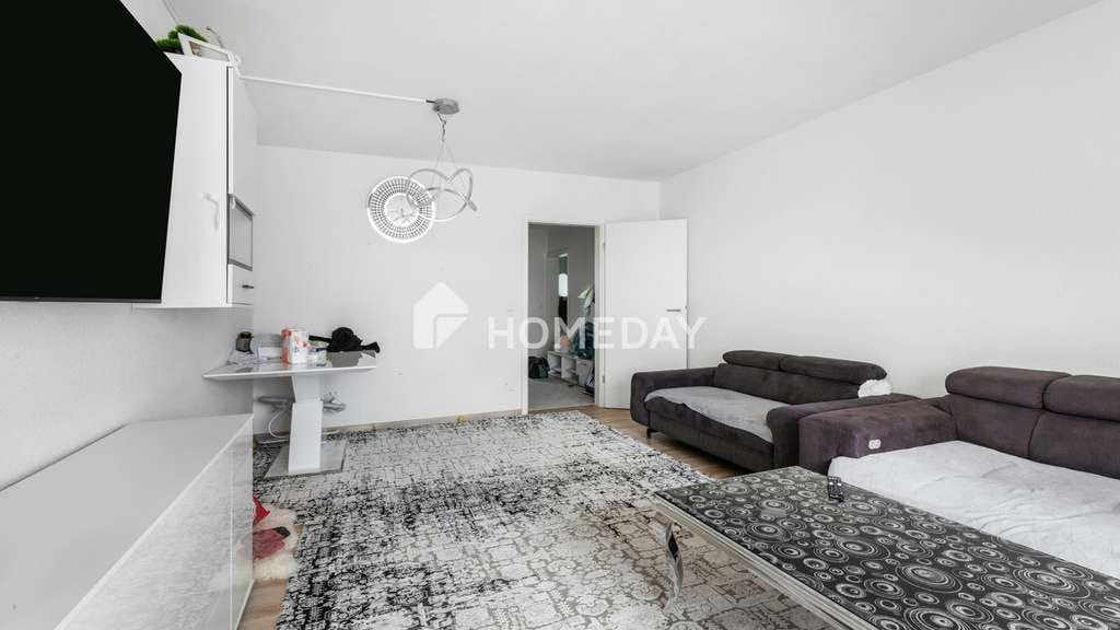 Immobilie in Immenstaad am Bodensee - Lichtdurchflutete Wohnung mit Seeblick und Loggia – Wohnen mit Weitblick in Immenstaad - Bild 1