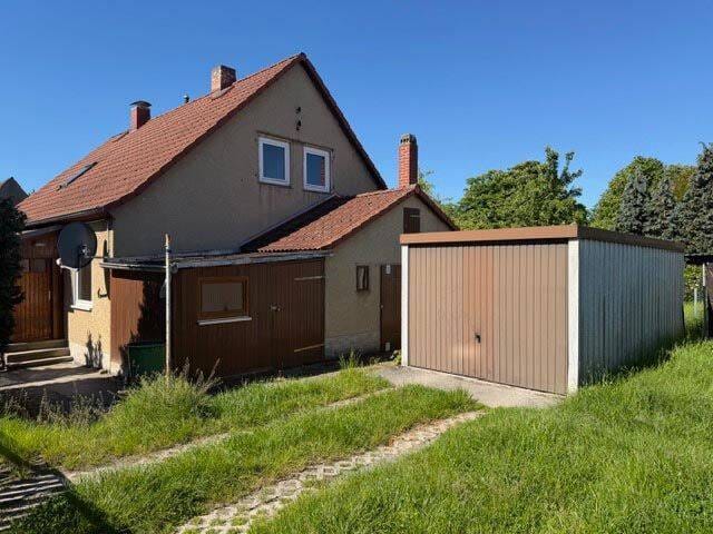 Immobilie in Eisenberg - Doppelhaushälfte mit Garage und Garten - Bild 0