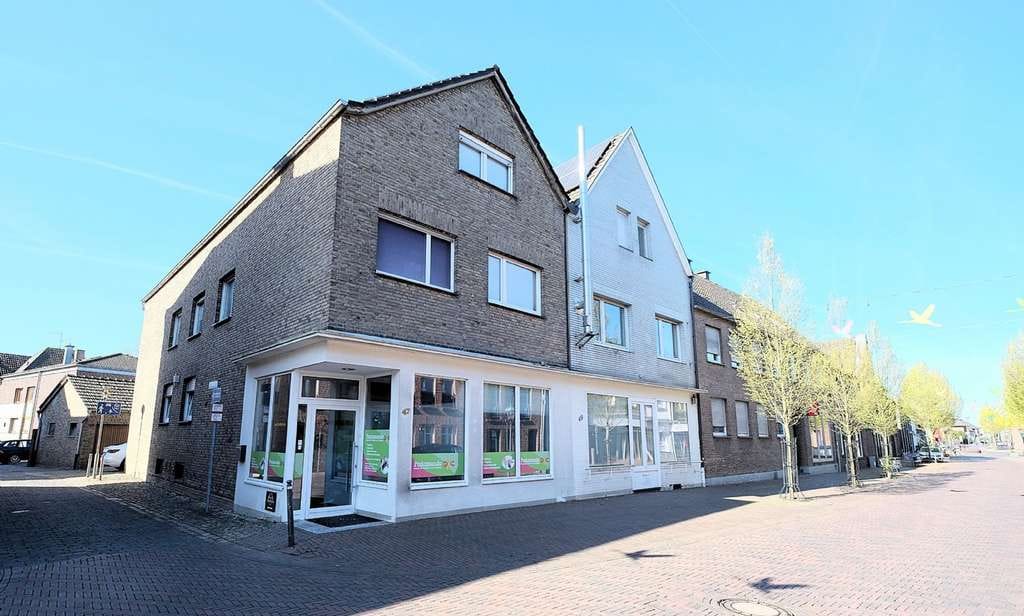 Immobilie in Kranenburg - Energieeffizientes Wohn- und Geschäftshaus mit großer Dachterrasse - Bild 1