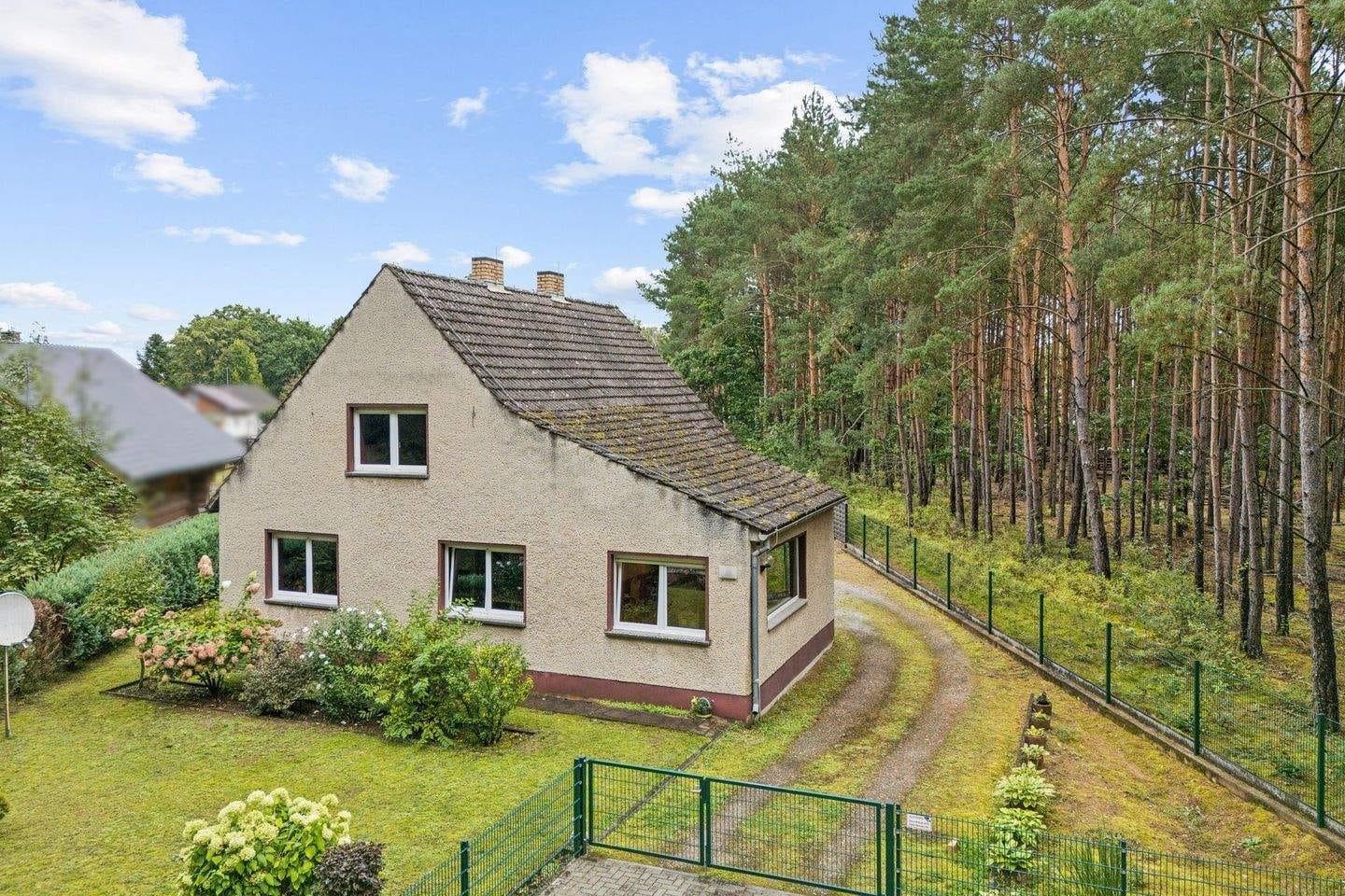 Immobilie in Storkow (Mark) - Einfamilienhaus am Waldrand mit Baureserve und zwei Zufahrten - Bild 1