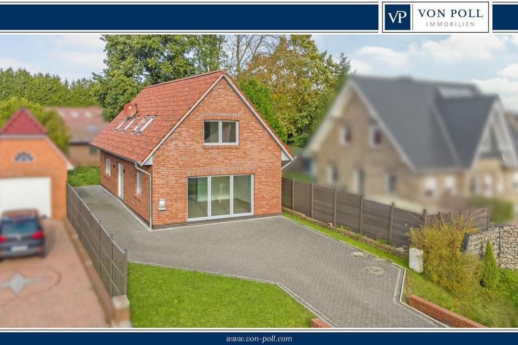 Immobilie in Leezdorf - Neuwertiges Zweifamilienhaus in ruhiger Lage von Leezdorf - Bild 0