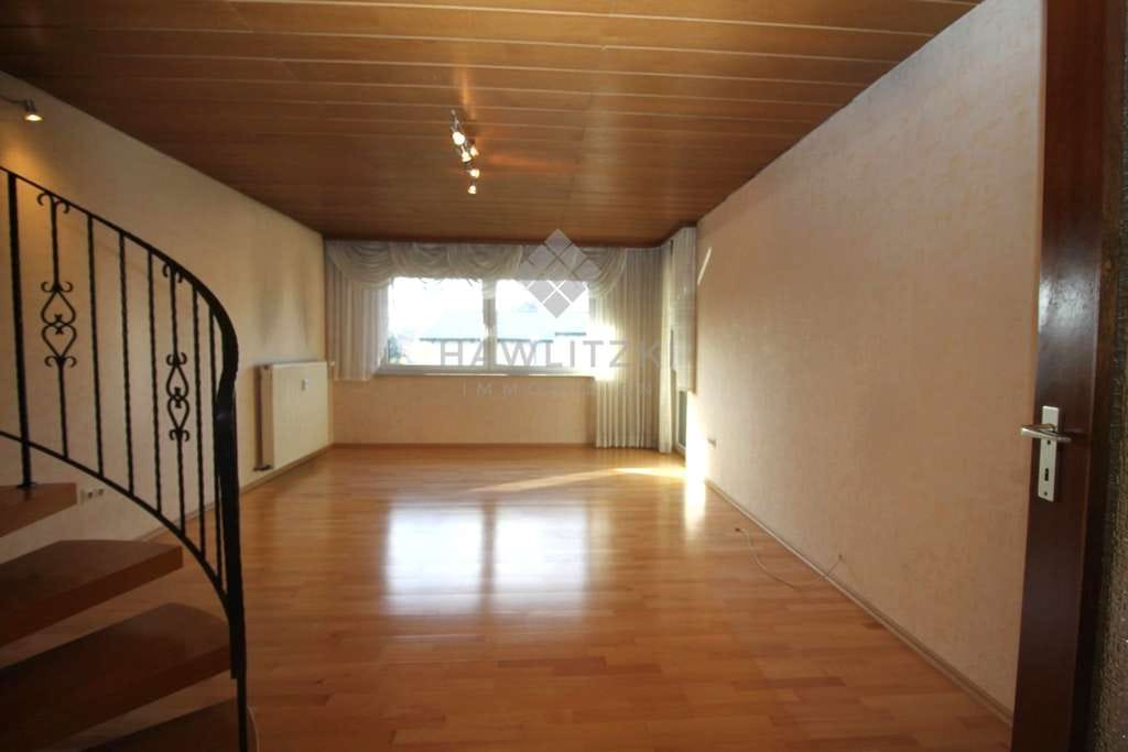 Immobilie in Wörth am Rhein - Großzügiges Wohnen mit Hauscharakter - Maisonettewohnung mit Garten und viel Raum zum Leben! - Bild 1