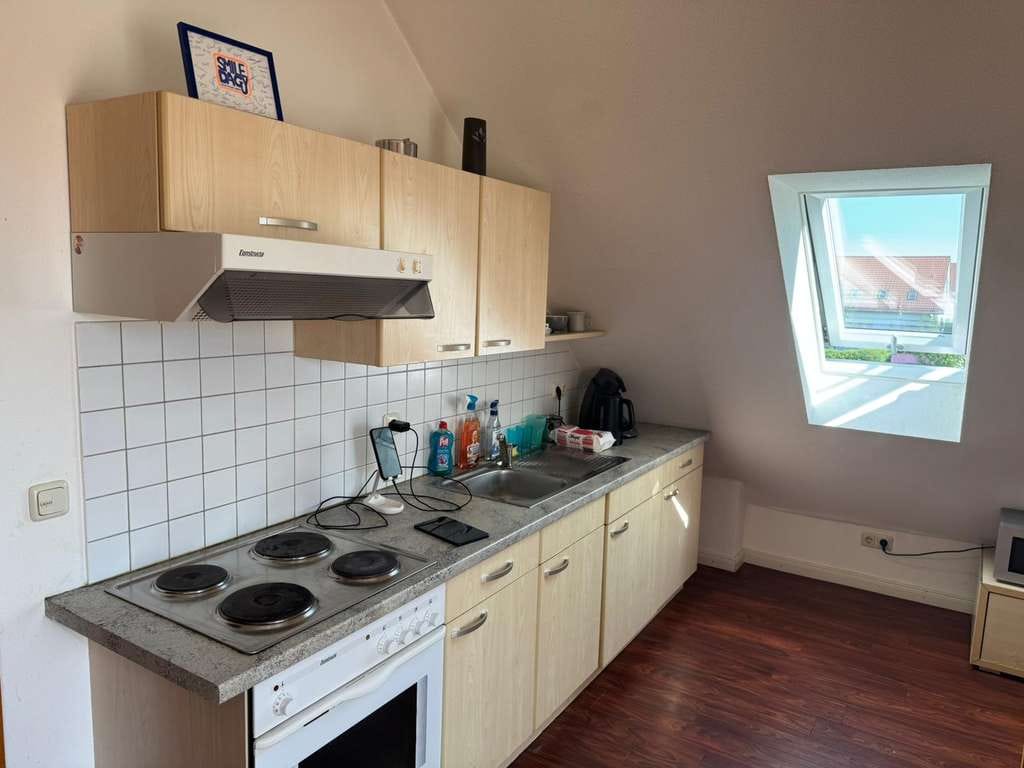 Immobilie in Hallbergmoos - gemütliche 2 Zi. DG Whg mit TG in ruhiger Lage - Bild 0