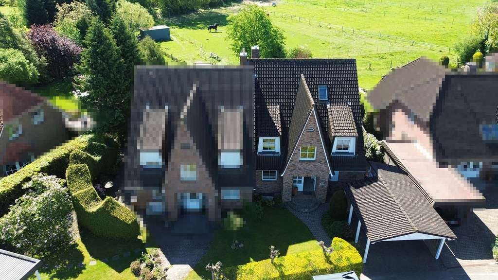Immobilie in Ellerbek - Unverbaubarer Süd-Blick über die Felder: Großzügige, familiengerechte Haushälfte! - Bild 1