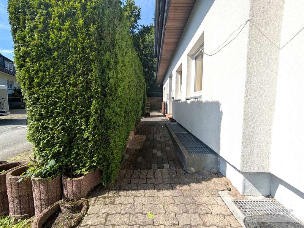 Immobilie in Wermelskirchen - Gepflegtes Vierparteienhaus mit Mietsteigerungspotential in ruhiger Waldrandlage von Wermelskirchen - Bild 4