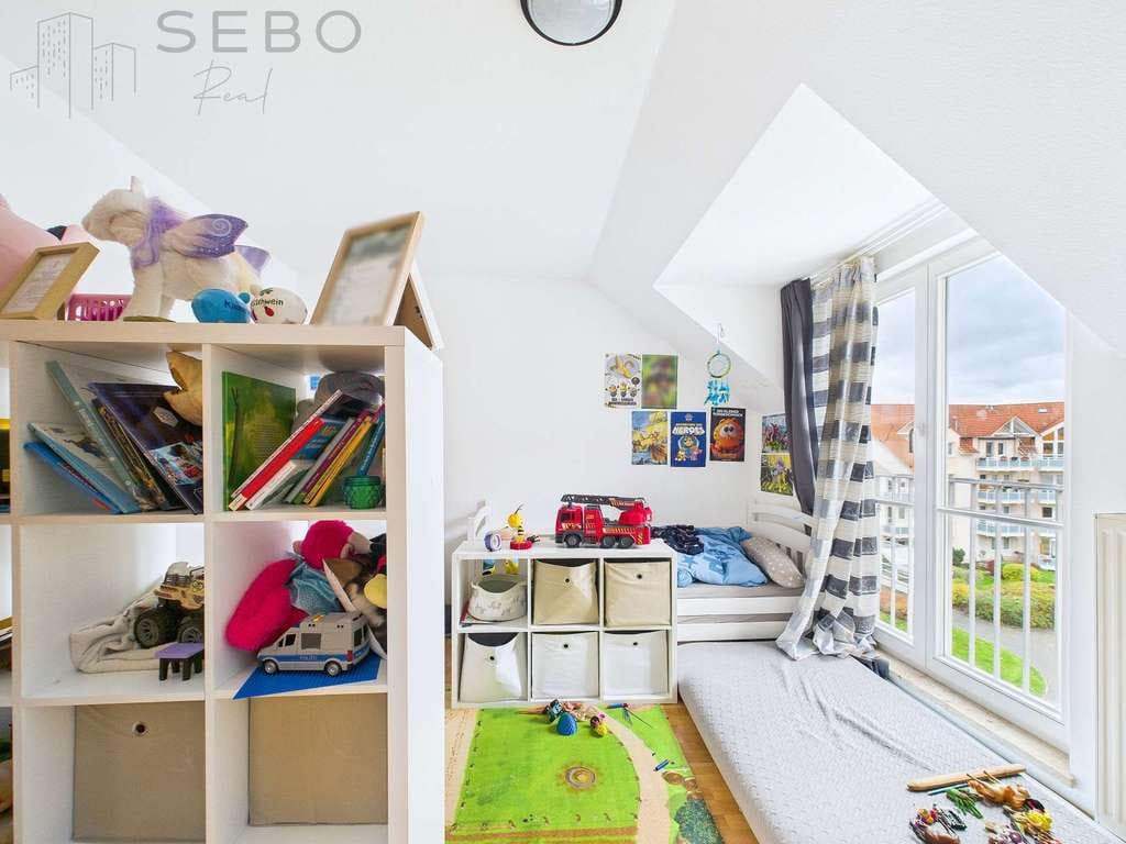 Immobilie in Borsdorf - Vermietete 2-Zimmer-Dachgeschosswohnung in grüner Lage von Borsdorf inkl. Tiefgarage - Bild 4