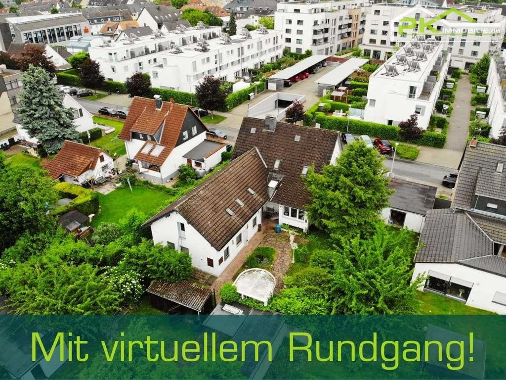 Immobilie in Monheim am Rhein - Großzügiges Wohnhaus mit Praxiseinheit in attraktiver Lage von Monheim am Rhein mit großem Potenzial - Bild 0
