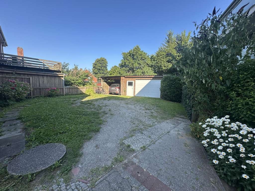 Immobilie in Niebüll - Attraktive Kapitalanlage in Niebüll –  Drei vermietete Wohneinheiten mit Garten
 - Bild 4
