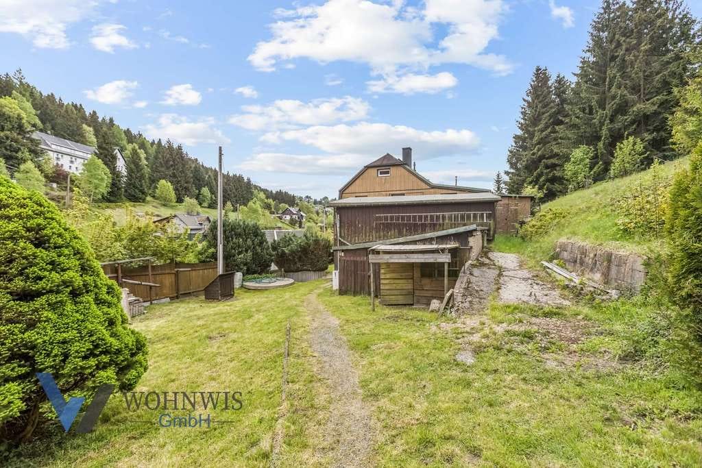 Immobilie in Klingenthal - Einfamilienhaus mit großem Grundstück, Bungalow, 2 Schuppen und mehreren Garagen in Klingenthal - Bild 3
