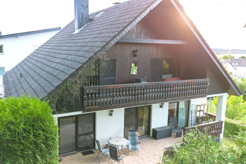 Immobilie in Usingen - Top gelegenes Mehrfamilienhaus mit 3 Wohneinheiten - Bild 1