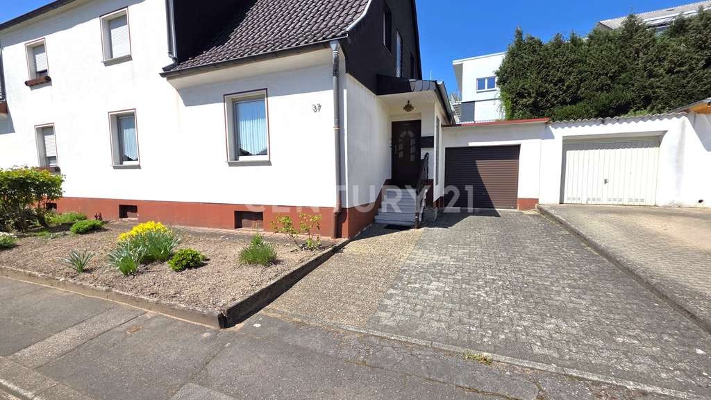 Immobilie in Sulzbach/Saar - Attraktives Familienidyll, Doppelhaushälfte mit Garten und Garage in Sulzbach - Hühnerfeld - Bild 3