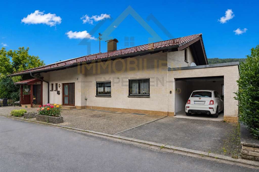Immobilie in Walldürn - Wohnen im Grünen – Eigenheim mit herrlichem Ausblick und viel Entwicklungspotenzial - Bild 0