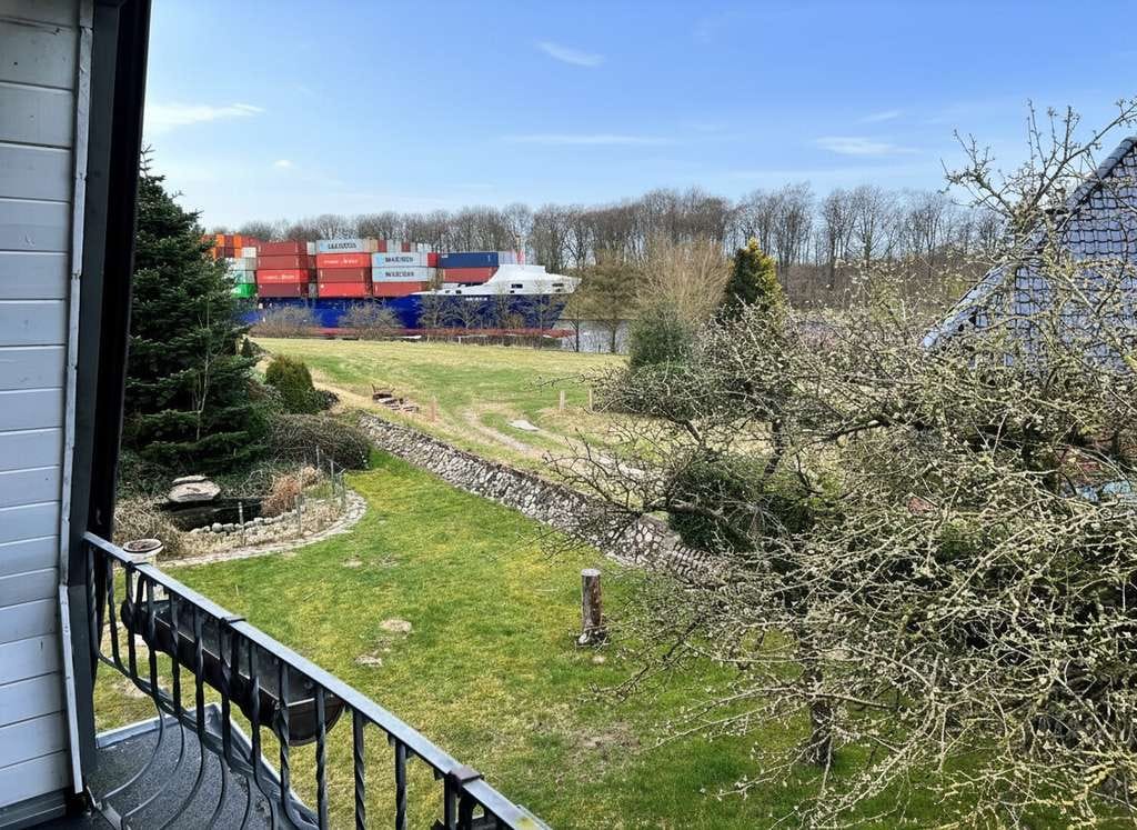 Immobilie in Westerrönfeld - Wohnen mit Schiffsverkehr: Charmantes Einfamilienhaus mit Einliegerwohnung am Nord-Ostsee-Kanal - Bild 2