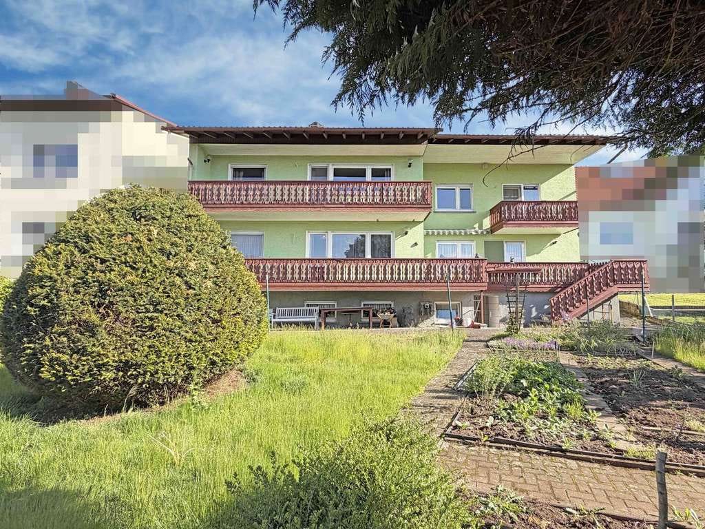 Immobilie in Mücke - Großzügiges Zweifamilienhaus mit Garten – ideal für Familien - Bild 0