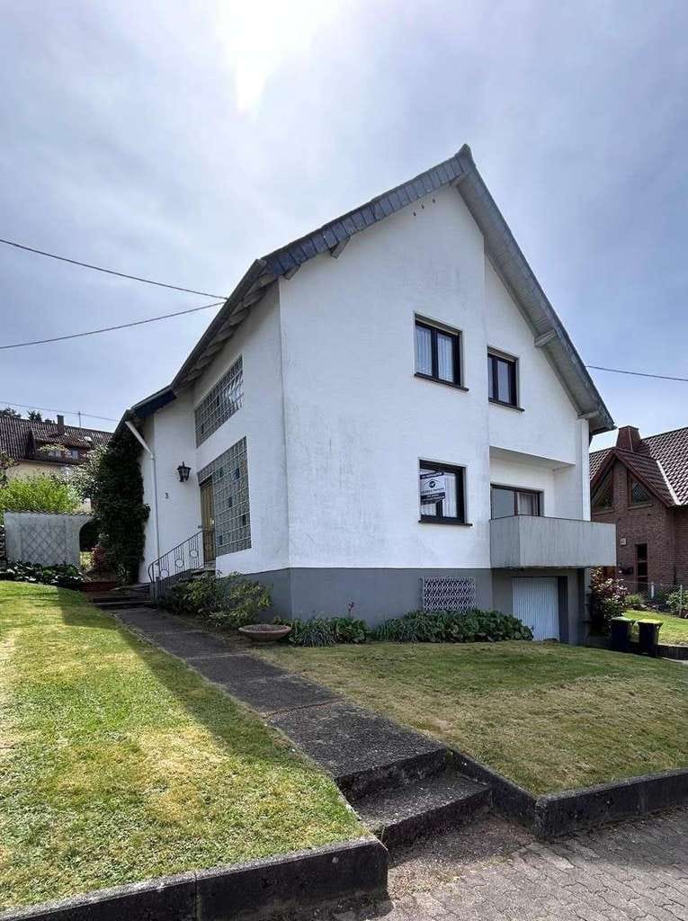 Immobilie in Marpingen - Charmantes Einfamilienhaus mit großem Potenzial und Garten in Marpingen - Bild 0