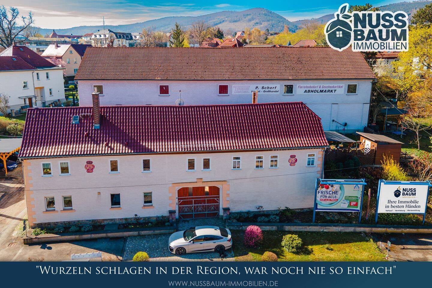 Immobilie in Saalfeld/Saale - Ein Zuhause mit Mehrwert - großzügig wohnen und Mieteinnahmen sichern - Bild 0